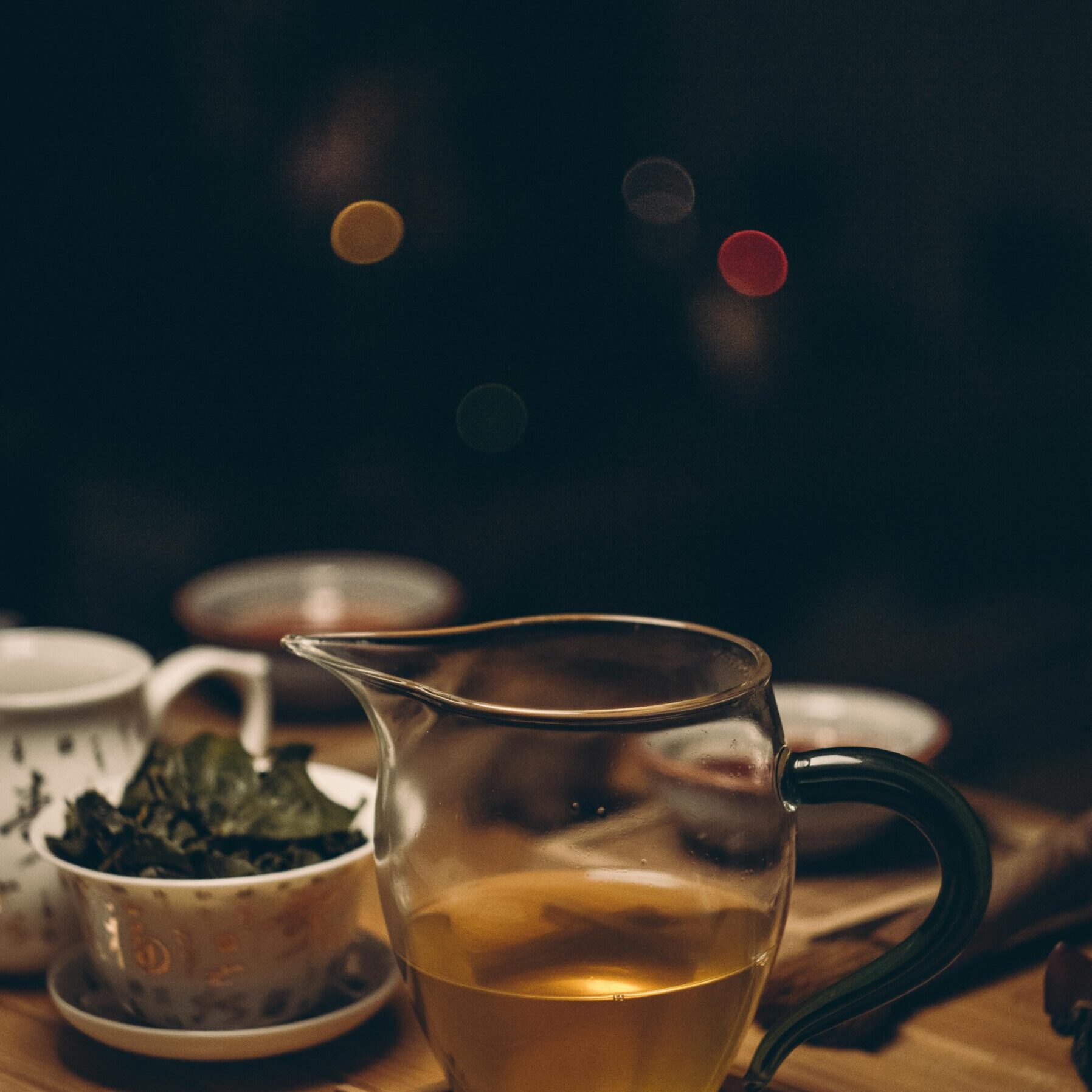 Clear Glass Cup of Tea on Brown Wooden Table